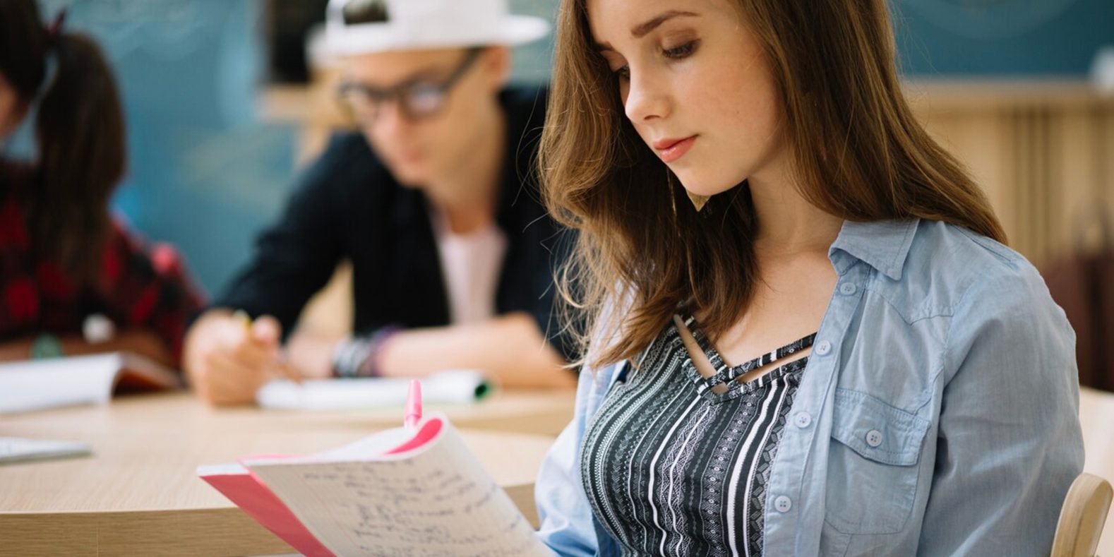 beautiful-student-working-homework_23-2147666846